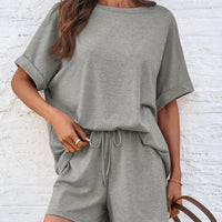 Round Neck T-Shirt and Drawstring Shorts Set in gray, featuring a relaxed fit and drawstring detail.