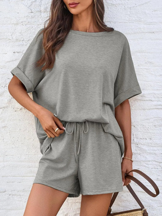 Round Neck T-Shirt and Drawstring Shorts Set in gray, featuring a relaxed fit and drawstring detail.