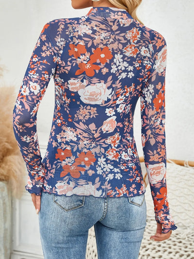 Floral Mock Neck Long Sleeve Top featuring a vibrant floral pattern in navy and pink, shown from the back with fitted design.