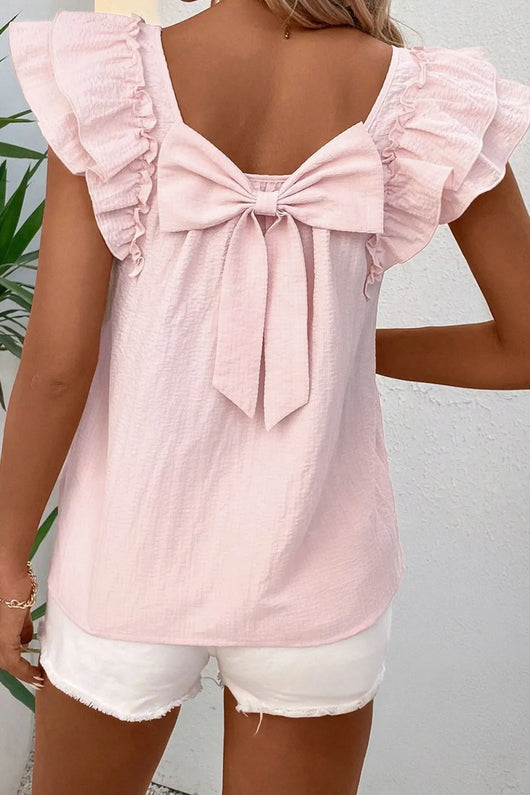 Textured Bow Knot Frilled Butterfly Sleeve Blouse with ruffled sleeves and back bow in light pink.