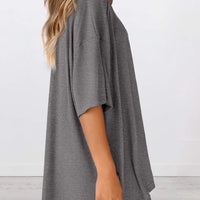 Full Size Oversized Slit Round Neck Top and Shorts Lounge Set Plus Size in grey, showcasing its relaxed fit and style.